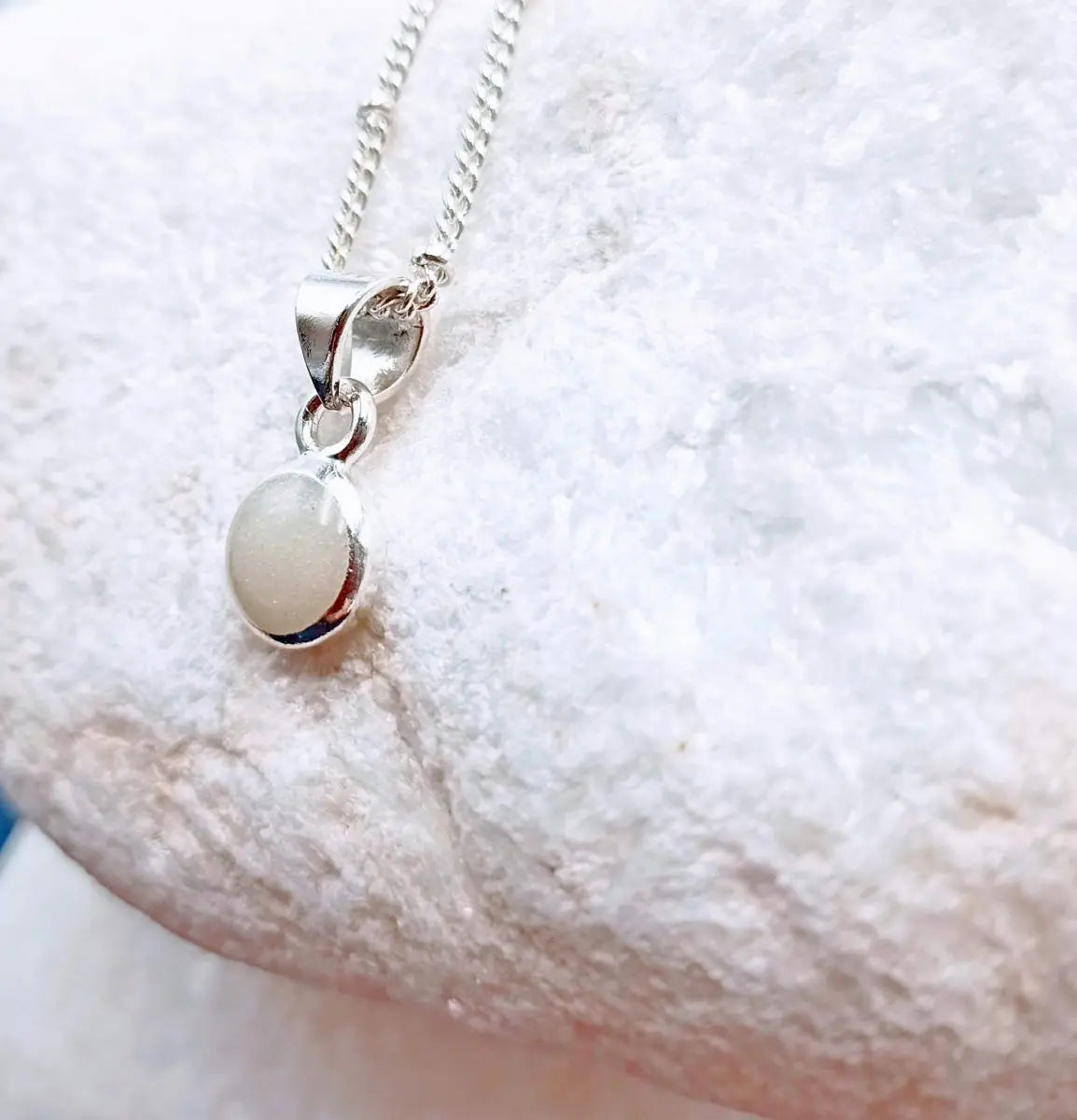 Small round breastmilk pendant