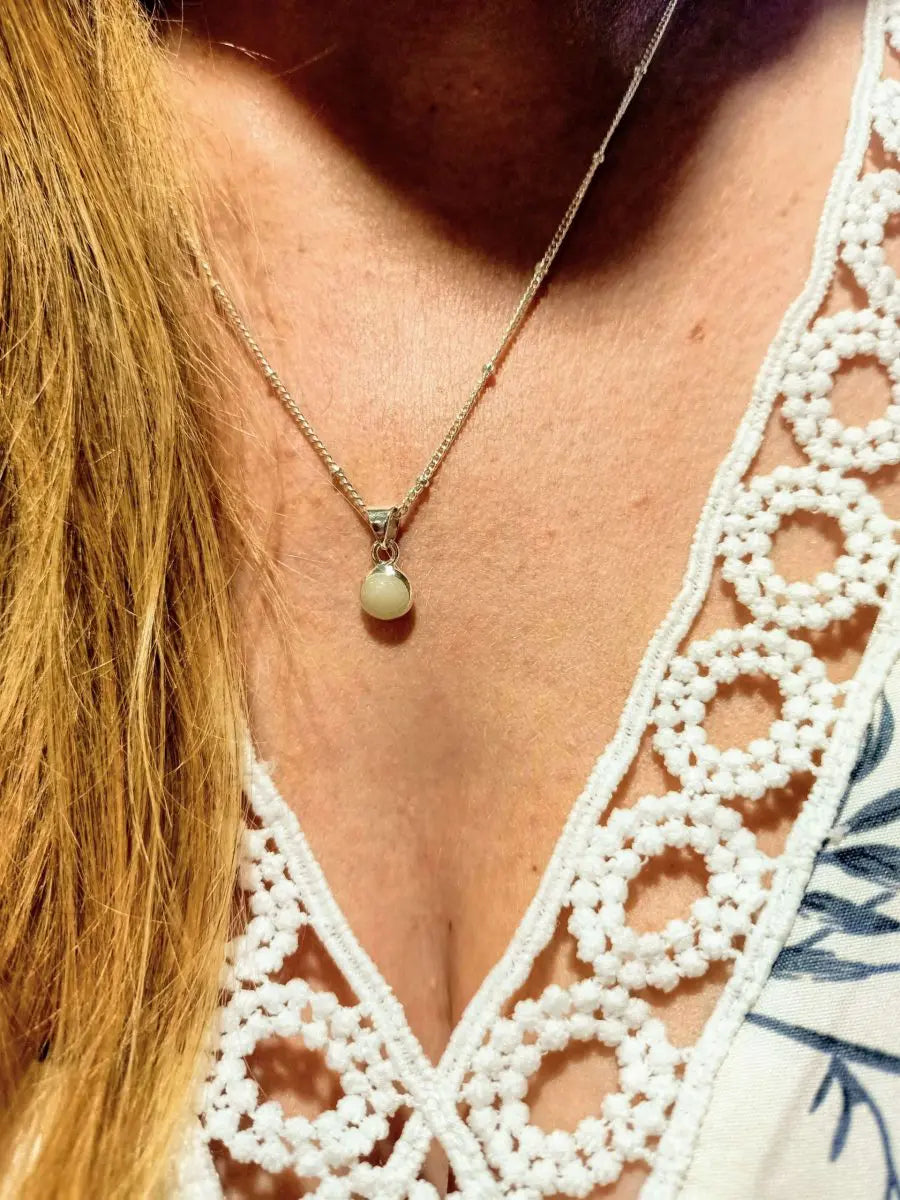 Small round breastmilk pendant